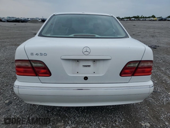 2001 Mercedes-Benz E-Class with VIN WDBJF70J51B332881, listed as a Copart auction lot 63487844 with 216,080 mi miles and Salvage Title. Bid and sale history available at carsss.com. Image 6.