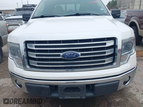 2014 Ford F-150 XL with VIN 1FTFW1CF2EKG46893, listed as a IAAI auction lot 41340410 with 158,798 mi miles and . Bid and sale history available at DreamBid. Image 6.