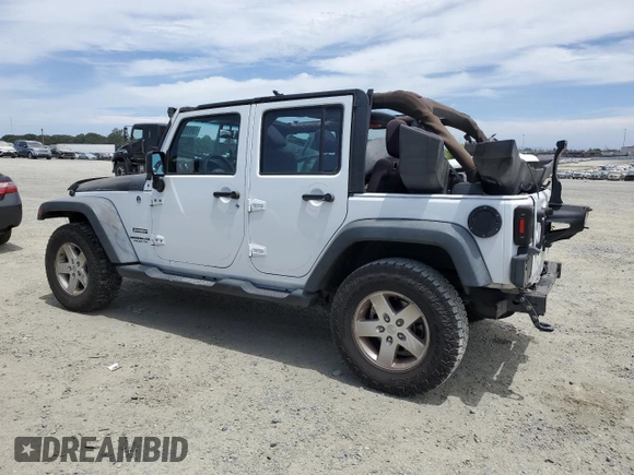 2013 Jeep Wrangler Unlimited Sport with VIN 1C4BJWDG8DL639781, listed as a Copart auction lot 63620025 with 84,720 mi miles and Salvage title. Bid and sale history available at DreamBid. Image 2.