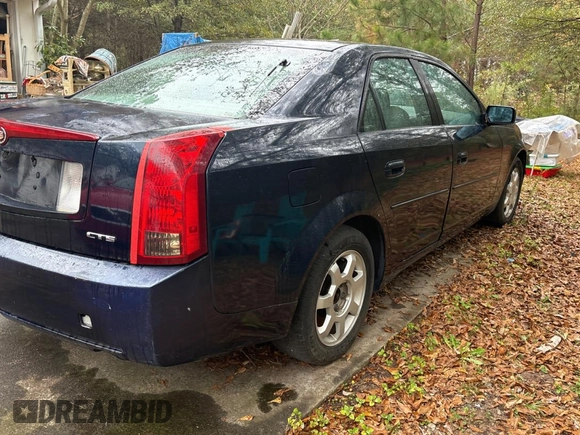 2004 Cadillac CTS with VIN 1G6DM577940109765, listed as a Copart auction lot 79450024 with 221,648 mi miles and Clean Title. Bid and sale history available at carsss.com. Image 4.