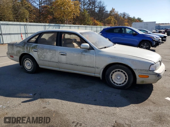 1994 Infiniti Q45 z VIN JNKNG01D3RM252218, wystawiony jako Copart lot #77230944 z przebiegiem 69 069 mil mil oraz Czysty tytuł • Clean title. Historia ofert i sprzedaży dostępna na DreamBid. Obrazek 4.