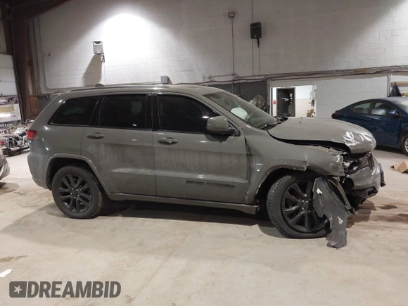 2019 Jeep Grand Cherokee Laredo E with VIN 1C4RJFAG9KC667394, listed as a IAAI auction lot 41316264 with 55,156 mi miles. Bid and sale history available at carsss.com. Image 13.