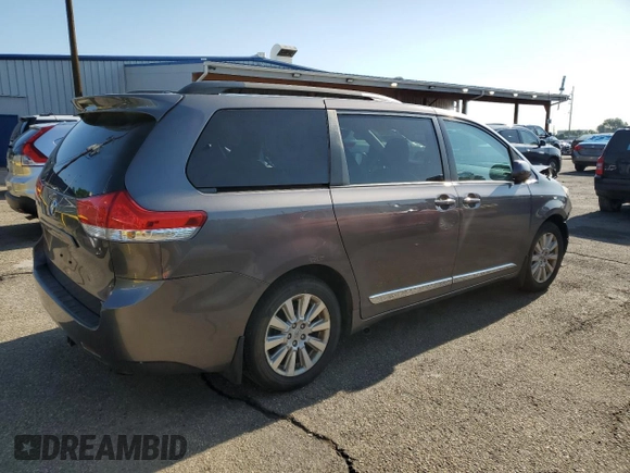 2014 Toyota Sienna Limited with VIN 5TDDK3DC8ES078175, listed as a Copart auction lot 61138585 with 98,527 mi miles and Salvage title. Bid and sale history available at DreamBid. Image 3.