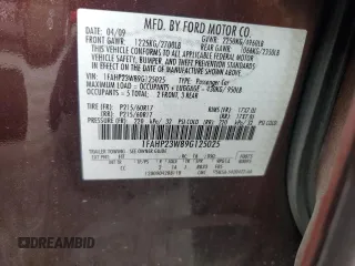 2009 Ford Taurus SE with VIN 1FAHP23W89G125025, listed as a Copart auction lot 80710004 with 114,176 mi miles and Salvage Title. Bid and sale history available at carsss.com. Image 13.