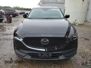 2018 Mazda CX-5 Touring z VIN JM3KFBCM4J0377280, wystawiony jako Copart lot #56688575 z przebiegiem 101 167 mil mil oraz Czysty tytuł • Clean title. Historia ofert i sprzedaży dostępna na DreamBid. Obrazek 5.