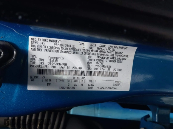 2014 Ford Focus SE with VIN 1FADP3F28EL193582, listed as a IAAI auction lot 41866782 with 166,733 mi miles. Bid and sale history available at carsss.com. Image 9.