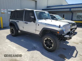 2012 Jeep Wrangler Unlimited Call of Duty MW3 with VIN 1C4BJWFG9CL199551, listed as a Copart auction lot 57097555 with 43,651 mi miles and Salvage title. Bid and sale history available at DreamBid. Image 4.