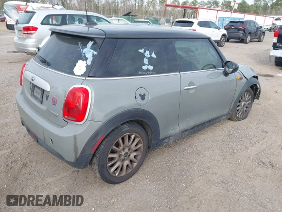2015 MINI Hardtop with VIN WMWXM5C59F3A58798, listed as a IAAI auction lot 41514988 with 127,771 mi miles and . Bid and sale history available at DreamBid. Image 4.