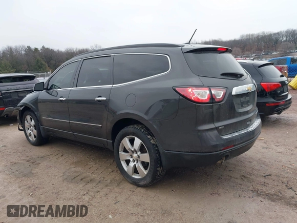 2015 Chevrolet Traverse LTZ with VIN 1GNKVJKD5FJ341677, listed as a IAAI auction lot 41632340 with 173,711 mi miles and . Bid and sale history available at DreamBid. Image 3.