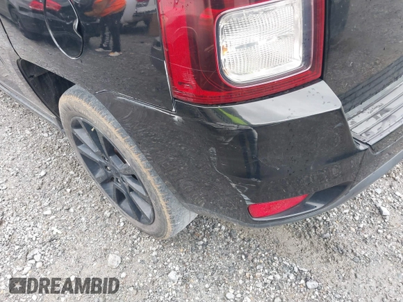 2014 Jeep Compass Sport with VIN 1C4NJCBA9ED823228, listed as a IAAI auction lot 41714992 with 168,996 mi miles. Bid and sale history available at carsss.com. Image 6.
