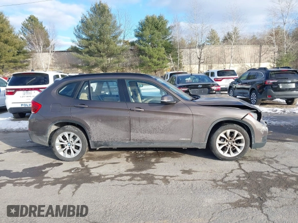 2014 BMW X1 xDrive28i with VIN WBAVL1C56EVY19340, listed as a IAAI auction lot 41340436 with 85,867 mi miles. Bid and sale history available at carsss.com. Image 13.
