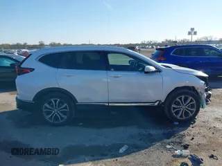 2021 Honda CR-V Touring with VIN 2HKRW1H9XMH402745, listed as a IAAI auction lot 41059541 with 24,282 mi miles. Bid and sale history available at carsss.com. Image 14.
