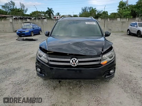 2014 Volkswagen Tiguan SE with VIN WVGAV3AXXEW543245, listed as a Copart auction lot 42288905 with 92,851 mi miles and Salvage title. Bid and sale history available at DreamBid. Image 14.