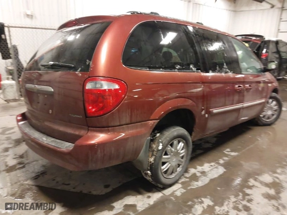2007 Chrysler Town & Country LWB Touring with VIN 2A4GP54L67R153147, listed as a IAAI auction lot 41577534 with 113,991 mi miles. Bid and sale history available at carsss.com. Image 4.