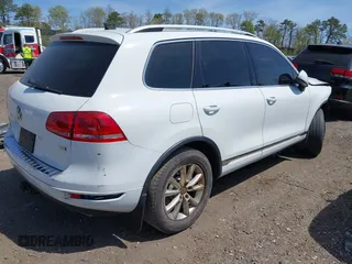 2013 Volkswagen Touareg Sport с VIN WVGEP9BP4DD013215, выставлен на аукционе IAAI как лот 42154801 с пробегом 159 556 миль миль и . История ставок и продаж доступна на DreamBid. Изображение 4.