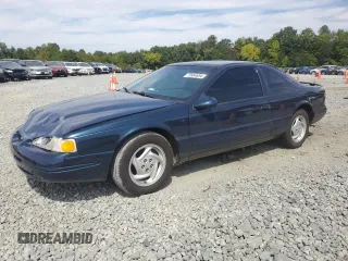 1996 Ford Thunderbird LX z VIN 1FALP62WXTH177910, wystawiony jako Copart lot #70954694 z przebiegiem 86 316 mil mil oraz Szkoda całkowita • Salvage title. Historia ofert i sprzedaży dostępna na DreamBid. Obrazek 1.