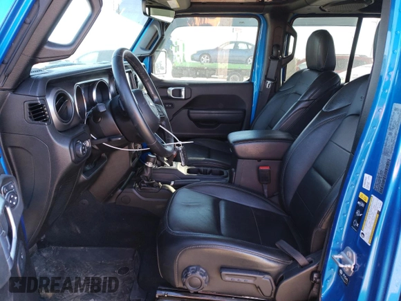 2022 Jeep Gladiator Willys with VIN 1C6JJTAM3NL132056, listed as a Copart auction lot 75723014 with 36,195 mi miles and Salvage title. Bid and sale history available at DreamBid. Image 7.