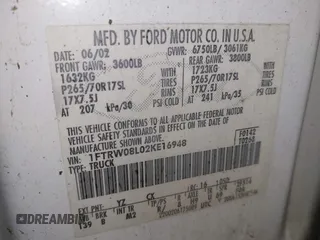 2002 Ford F-150 XLT with VIN 1FTRW08L02KE16948, listed as a IAAI auction lot 41881612 with 168,471 mi miles. Bid and sale history available at carsss.com. Image 9.