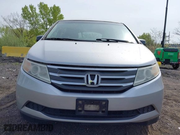2011 Honda Odyssey EX-L with VIN 5FNRL5H61BB067456, listed as a IAAI auction lot 42131999 with 150,358 mi miles and . Bid and sale history available at carsss.com. Image 12.