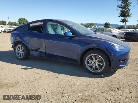 2024 Tesla Model Y Long Range with VIN 7SAYGDEEXRF983989, listed as a Copart auction lot 64035155 with 12,137 mi miles and Salvage title. Bid and sale history available at DreamBid. Image 4.