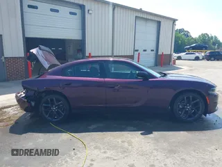 2022 Dodge Charger SXT with VIN 2C3CDXBG1NH231355, listed as a IAAI auction lot 41632420 with 28,333 mi miles and . Bid and sale history available at DreamBid. Image 13.