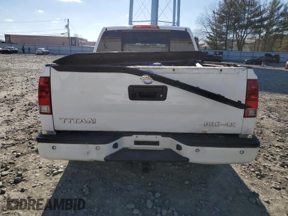 2013 Nissan Titan Pro-4X с VIN 1N6AA0EC0DN301779, выставлен на аукционе Copart как лот 47517355 с пробегом 201 469 миль миль и Чистый • Clean title. История ставок и продаж доступна на DreamBid. Изображение 6.