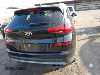 2019 Hyundai Tucson Sport z VIN KM8J33AL9KU878474, wystawiony jako IAAI lot #41568959 z przebiegiem 97 412 mil mil oraz . Historia ofert i sprzedaży dostępna na DreamBid. Obrazek 16.