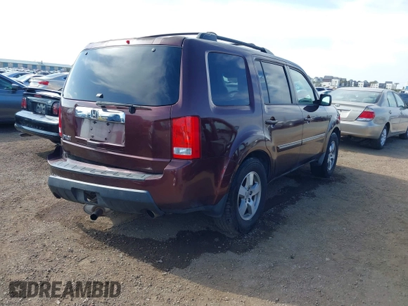 2010 Honda Pilot EX with VIN 5FNYF3H48AB001541, listed as a IAAI auction lot 41990756 with 171,618 mi miles and . Bid and sale history available at carsss.com. Image 4.