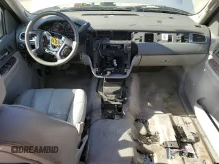 2007 Chevrolet Tahoe LT with VIN 1GNFC13J17J145992, listed as a Copart auction lot 57673385 with 151,804 mi miles and Salvage title. Bid and sale history available at DreamBid. Image 8.