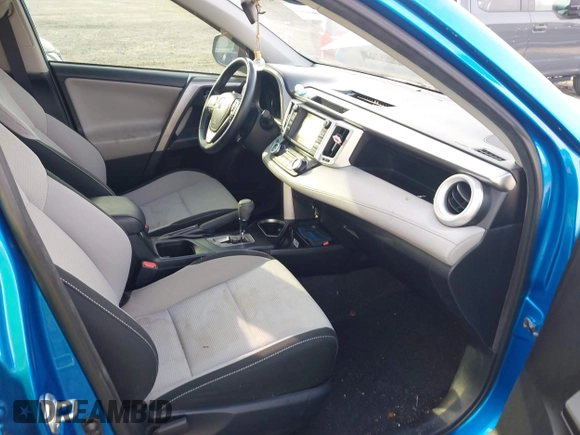 2018 Toyota RAV4 XLE with VIN JTMWFREV3JJ725847, listed as a IAAI auction lot 42110555 with 84,503 mi miles and . Bid and sale history available at DreamBid. Image 5.