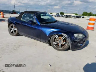 2007 Mazda MX-5 Miata Touring with VIN JM1NC25F770138120, listed as a Copart auction lot 60777425 with 184,029 mi miles and Salvage title. Bid and sale history available at DreamBid. Image 4.