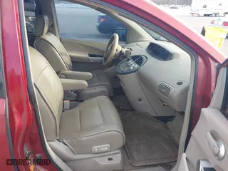 2005 Nissan Quest with VIN 5N1BV28U15N138844, listed as a IAAI auction lot 42005350 with 187,244 mi miles. Bid and sale history available at carsss.com. Image 5.