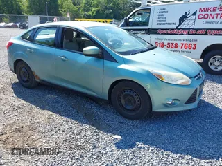 2012 Ford Focus SE z VIN 1FAHP3F25CL307066, wystawiony jako IAAI lot #42650943 z przebiegiem 172 643 mil mil oraz . Historia ofert i sprzedaży dostępna na DreamBid. Obrazek 1.