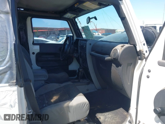 2007 Jeep Wrangler X with VIN 1J4FA24137L128418, listed as a IAAI auction lot 42317921 with 148,412 mi miles and . Bid and sale history available at DreamBid. Image 5.