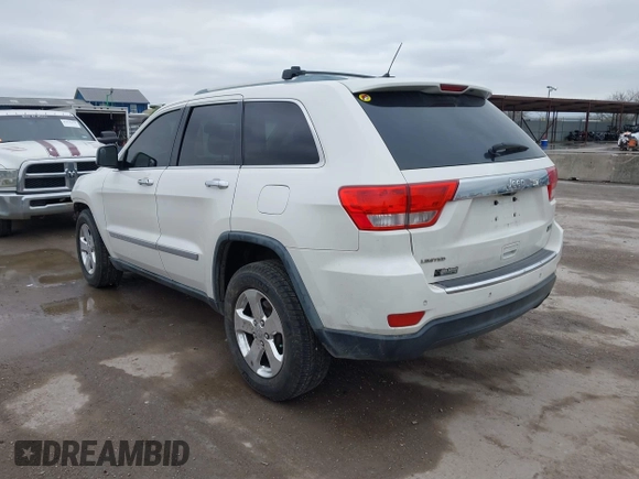 2012 Jeep Grand Cherokee Limited with VIN 1C4RJEBG4CC229571, listed as a IAAI auction lot 41565669 with 221,268 mi miles. Bid and sale history available at carsss.com. Image 3.