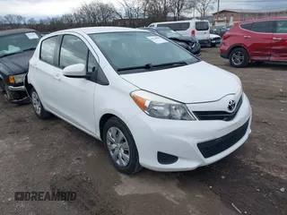 2014 Toyota Yaris L with VIN JTDKTUD34ED589582, listed as a IAAI auction lot 41538884 with 87,798 mi miles. Bid and sale history available at carsss.com. Image 1.