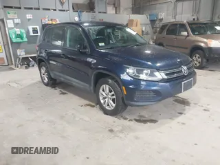 2012 Volkswagen Tiguan SE with VIN WVGAV7AX7CW579544, listed as a IAAI auction lot 42161737 with 123,783 mi miles and . Bid and sale history available at DreamBid. Image 1.