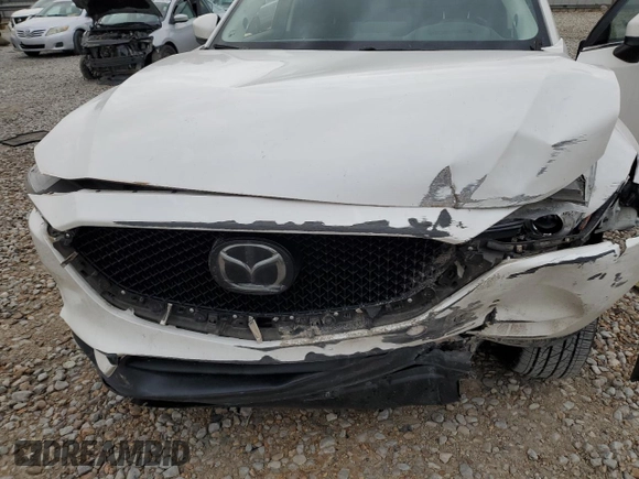 2021 Mazda CX-5 Grand Touring with VIN JM3KFBDM2M1436789, listed as a Copart auction lot 49534305 with 65,790 mi miles and Salvage Title. Bid and sale history available at carsss.com. Image 13.