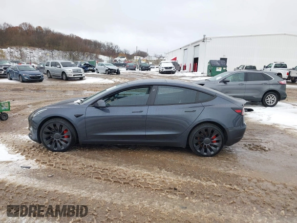 2023 Tesla Model 3 Performance with VIN 5YJ3E1EC6PF590739, listed as a IAAI auction lot 40919165 with 20,474 mi miles. Bid and sale history available at carsss.com. Image 15.