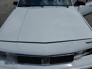 1995 Oldsmobile Cutlass Ciera with VIN 1G3AJ5545S6325270, listed as a Copart auction lot 50148265 with 81,883 mi miles and Salvage Title. Bid and sale history available at DreamBid. Image 11.