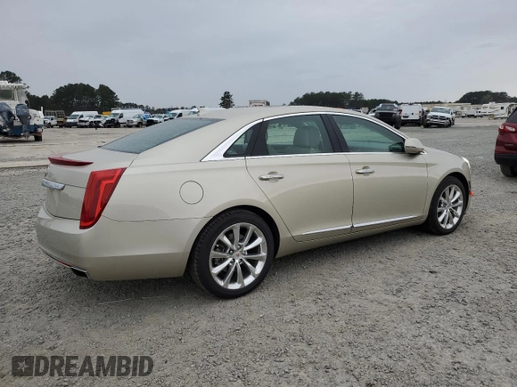 2014 Cadillac XTS Premium with VIN 2G61P5S32E9195930, listed as a Copart auction lot 48320165 with 31,026 mi miles and Salvage Title. Bid and sale history available at DreamBid. Image 3.
