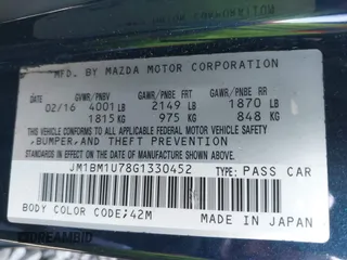 2016 Mazda 3 i Sport with VIN JM1BM1U78G1330452, listed as a IAAI auction lot 41934800 with 111,688 mi miles and . Bid and sale history available at carsss.com. Image 9.