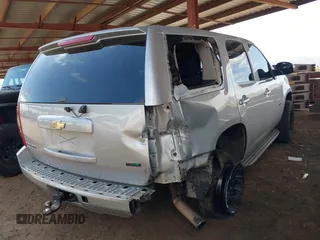 2011 Chevrolet Tahoe LS with VIN 1GNSCAE02BR181767, listed as a IAAI auction lot 42078569 with 212,857 mi miles and . Bid and sale history available at DreamBid. Image 4.