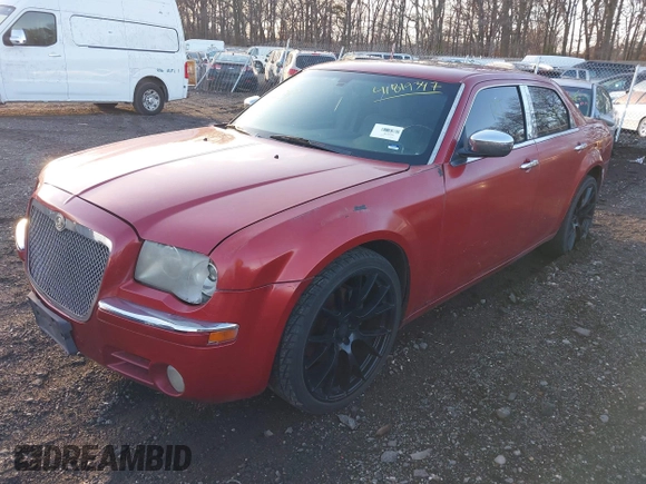 2007 Chrysler 300 C with VIN 2C3KA63H87H697826, listed as a IAAI auction lot 41819347 with 999,999 mi miles. Bid and sale history available at carsss.com. Image 2.