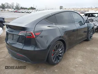 2024 Tesla Model Y Performance with VIN 7SAYGDEF7RF053265, listed as a IAAI auction lot 42132172 with 17,102 mi miles and . Bid and sale history available at DreamBid. Image 4.