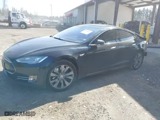 2014 Tesla Model S 60 kWh Battery with VIN 5YJSA1H19EFP45024, listed as a IAAI auction lot 41960222 with 108,573 mi miles. Bid and sale history available at carsss.com. Image 18.
