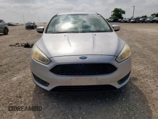2015 Ford Focus SE z VIN 1FADP3F22FL343834, wystawiony jako Copart lot #58076265 z przebiegiem 101 891 mil mil oraz Szkoda całkowita • Salvage title. Historia ofert i sprzedaży dostępna na DreamBid. Obrazek 5.