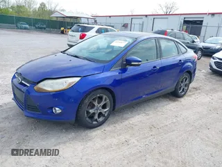 2013 Ford Focus SE with VIN 1FADP3F23DL216426, listed as a IAAI auction lot 42144277 with 134,839 mi miles and . Bid and sale history available at carsss.com. Image 2.