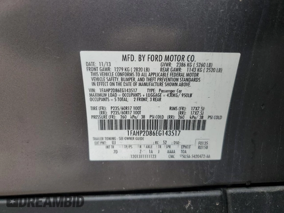 2014 Ford Taurus SE z VIN 1FAHP2D86EG143517, wystawiony jako Copart lot #51066975 z przebiegiem 134 892 mil mil oraz Szkoda całkowita • Salvage title. Historia ofert i sprzedaży dostępna na DreamBid. Obrazek 14.