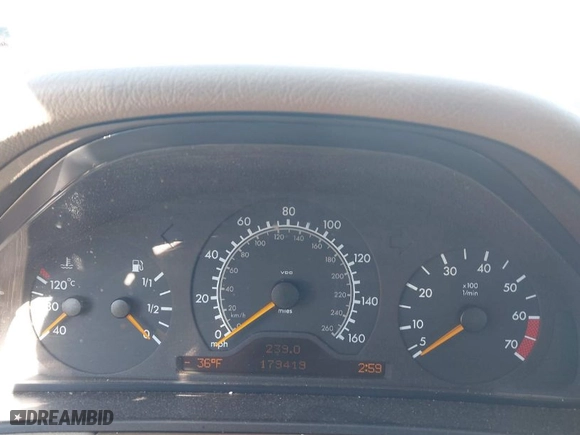 1999 Mercedes-Benz E-Class with VIN WDBJF65H3XA764352, listed as a IAAI auction lot 41646943 with 179,419 mi miles. Bid and sale history available at carsss.com. Image 7.